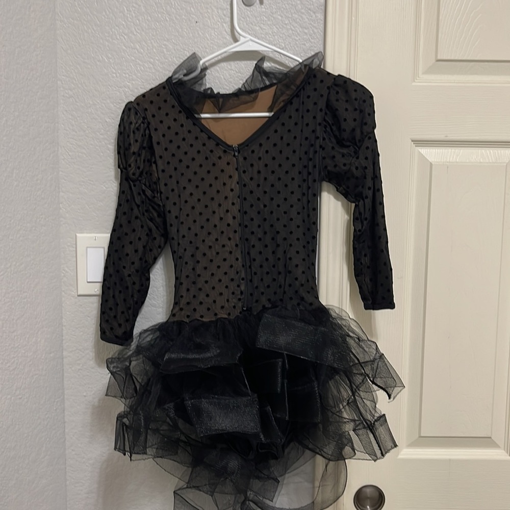 Adult medium sheer black with velvet polka dots. Hi/low unitard dress for jazz